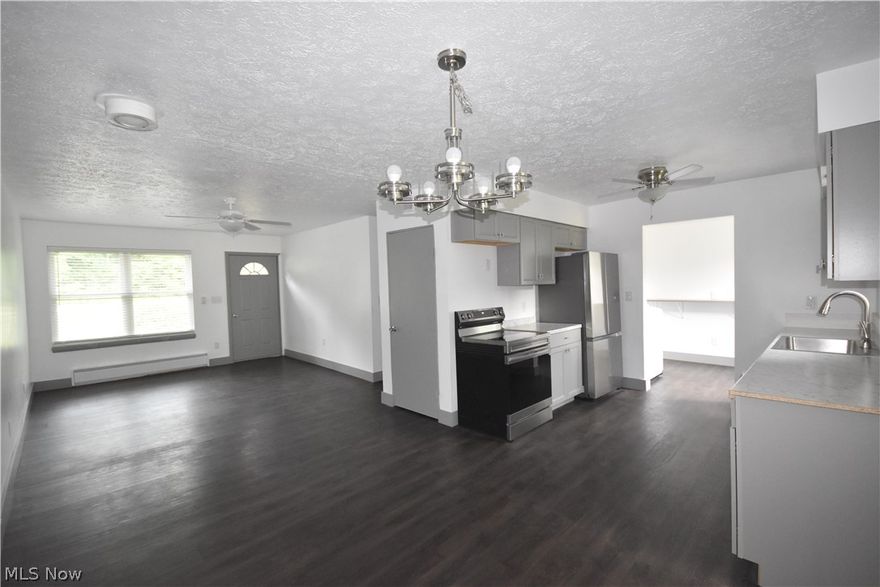 Open House Thu Jun 27, 6:00PM-8:00PM!  Welcome to 18490 Shaw Road, a beautifully updated single-family ranch in the picturesque countryside of Chagrin Falls, Ohio. This 1,568-square-foot home offers a perfect blend of modern amenities and serene living on 1.5 acres in the award-winning Kenston School District.
Step inside to discover a spacious and open floor plan featuring luxury vinyl tile (LVT) flooring throughout. The heart of the home is the expansive great room, measuring 26 feet by 13 feet, which seamlessly flows into the dining and living rooms, creating an inviting space for entertaining and everyday living.
The brand-new kitchen is a chef's dream, complete with new appliances, ample counter space, and contemporary cabinetry. Both bathrooms have been fully renovated providing a fresh and modern feel. The laundry room is equipped with a new washer and dryer for your convenience.
This home has been thoughtfully updated with a new circuit breaker panel, completely rewired electrical system, a new hot water tank, and a state-of-the-art water treatment system. Enjoy the peace of mind that comes with a fully updated home.
Outside, the attached 2-car garage provides ample parking and storage. Embrace the tranquil country lifestyle with nearby LaDue Reservoir, perfect for fishing, kayaking, and paddle boarding. For those who love the outdoors, a hike through the woods in the back of the property leads to Lake LaDue. End your day with stunning sunsets as the rear of the house faces west, offering breathtaking views.  Pets are welcome, and dogs are allowed to join you in this beautiful setting. Owner/Agent prefers a long-term tenant to enjoy this smoke-free, drug-free home.  Don't miss out on this incredible rental opportunity at 18490 Shaw Road, where modern living meets country charm. Schedule a showing today and make this your new home!