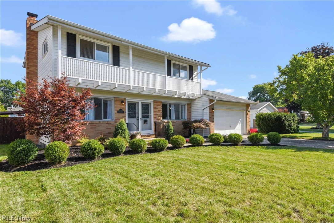 Welcome Home to Sandy Lane! This renovated, bright 4 bedroom, 1.5 bath colonial offers abundant natural light, hardwood floors throughout, and many modern updates. Living room boasts gas fireplace with distressed wood mantle (interior re-built 2018) flanked by custom built-ins. Dining room was a complete to the studs gut renovation in 2013, now offers hardwood flooring and wainscoting, perfect for dinner parties! Large eat in kitchen (complete renovation in December 2019), offers new cabinets, Corian counter tops, and porcelain tile floor. All new stainless steel appliances, as well as kitchen table and seating stay with the home. A half bath finishes out the first floor (December 2019). Upstairs find 4 bedrooms and a full bath (2017). Partially finished basement is a great additional living space. Do not miss the large, fully fenced backyard perfect for get-togethers and entertaining, complete with private, fully landscaped 713 sq ft paver patio, landscape lighting, deck, and co