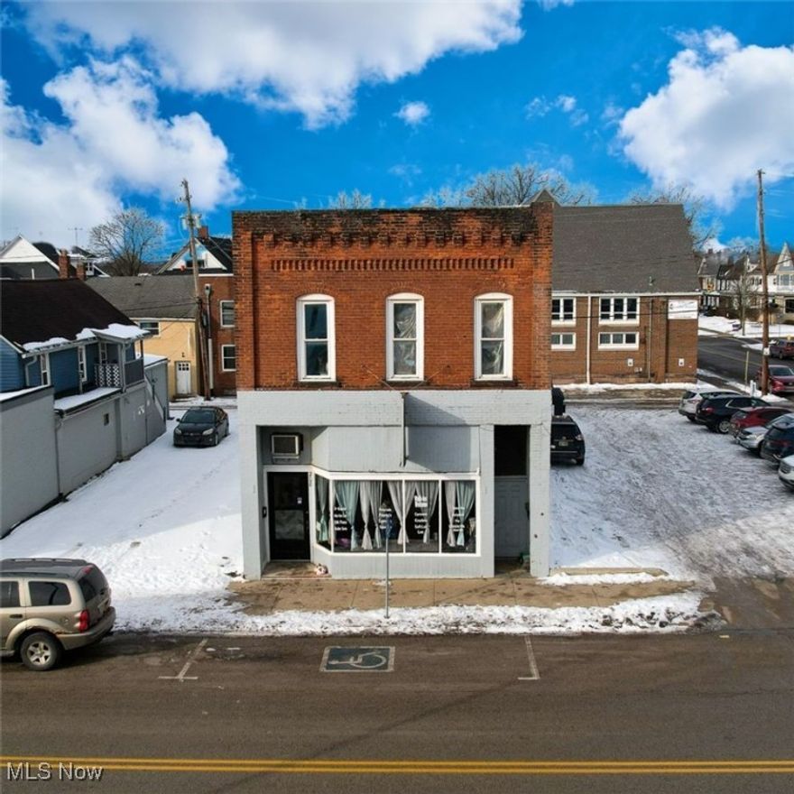 ASPIRING ENTREPRENEURS!! Here's an incredible opportunity you don't want to miss- a versatile mixed-use property with prime downtown frontage! The main space is currently set up as a beauty salon but can easily be transformed into any office or business space you envision. Upstairs, you'll find two spacious 1-bedroom, 1-bathroom apartments. Imagine the convenience of living upstairs while running your business right below, or renting out the units for additional income. The property also includes a large storage area in the back, previously used as a boutique, offering even more flexibility for your ideas. Recent upgrades in the salon include neutral paint throughout, LVP flooring, a new HVAC system, and a new water heater- saving you time and effort. Don't wait this is a CASH COW! Call today to see this property before it's off the market. With this price and potential, it won't last long!