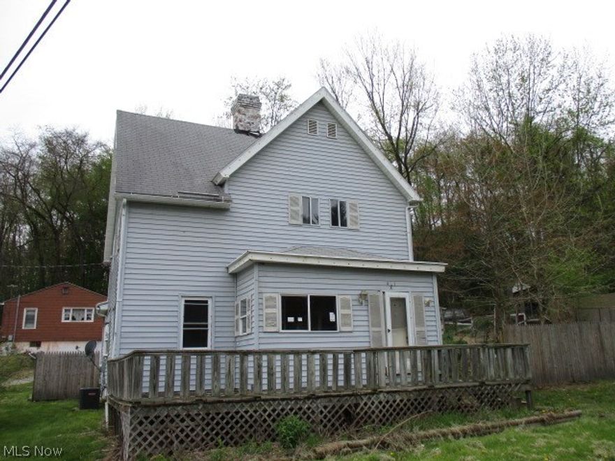 Spacious conveniently located vinyl sided 3 bedroom, 1.5 bath 2 story with second 40' x 100' lot included.