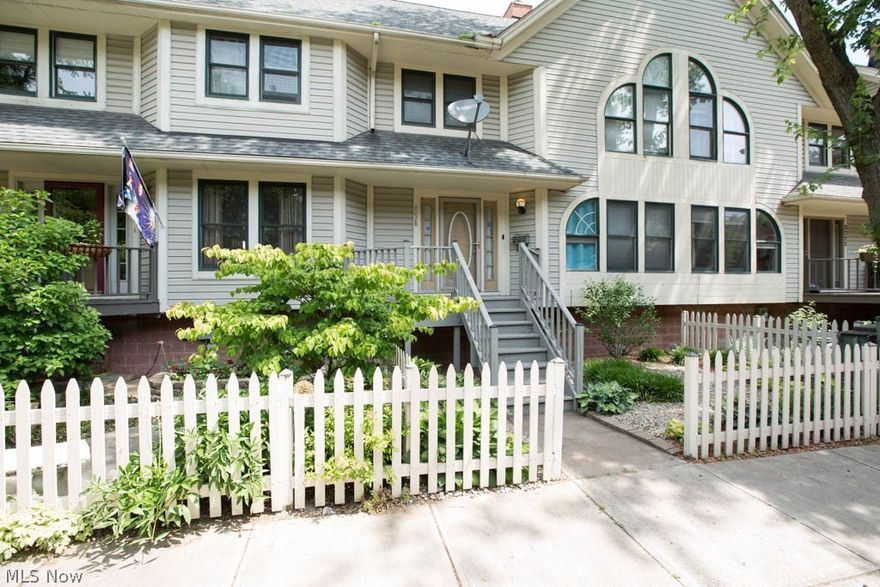 Unbelievable townhome in the heart of Ohio City!  Perfectly situated between W. 25th St. and Hingetown, this beautiful townhouse provides you with very close proximity to all the restaurants, shops, and events that Ohio City has to offer, while also giving you the privacy and quiet feel of living on a cul-de-sac.  The first floor boasts a 2 sided fireplace accenting the living and dining rooms, leading to a large private deck.  Fully fenced yard with a detached 2 car garage that is conveniently located on a quiet cul-de-sac!  The second floor has 2 bedrooms and a spa-like shower and jetted tub.  The basement is also completely finished and features a tv projector, Murphy bed, and a full bath making it usable as a huge extra bedroom.  A few of the improvements include a newer roof (2015), new flooring (1st and 2nd floors 2019), new hardwood flooring down basement stairs and in basement (2019), fully remodeled basement bathroom (2020), freshly painted (2019), new A/C and furnace (2019).