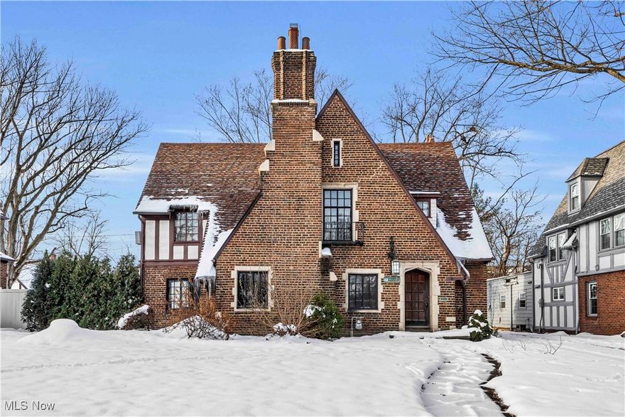 CHARMING SHAKER HEIGHTS HIDDEN GEM! This spacious brick front classic 3-level property is waiting for your finishing touches to make a dream come home come to life. With a new roof (2021) and a stunning backyard, this home is perfect for making memories.  Nestled across from the community ice skating rink, enjoy winter wonderland fun and year-round neighborhood charm. Inside, discover an open floor plan on the main level that's perfect for gathering, featuring a cozy fireplace in the living room and another in the family room. The master bedroom boasts its own fireplace, adding warmth and ambiance to this beautiful retreat. With potentially 5 bedrooms and two full and 2 half bathrooms in total, this home offers plenty of space!  A rare find in Shaker Heights!