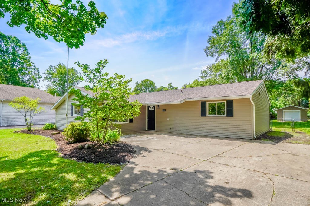 Don’t miss your chance to see this updated 4 bedroom ranch on nearly half an acre in Field schools! Inside, the spacious living room features vinyl plank flooring and counter seating with a view into the beautiful kitchen, complete with granite countertops, stainless steel appliances, bright white cabinetry, and new flooring. A light filled Florida room offers a great place to relax and provides access to the paver patio and fully fenced backyard.
All four bedrooms are nicely sized with new carpet, including the primary with its own laundry area. The renovated full bath in the hall includes a tub/shower with tile surround. A half bath completes the space.
Outside, you’ll find plenty of parking in the driveway, a detached one car garage, and two oversized sheds for extra storage. New flooring, paint, A/C, interior doors, lighting, and more make this a move-in ready find. Call today to schedule your showing!