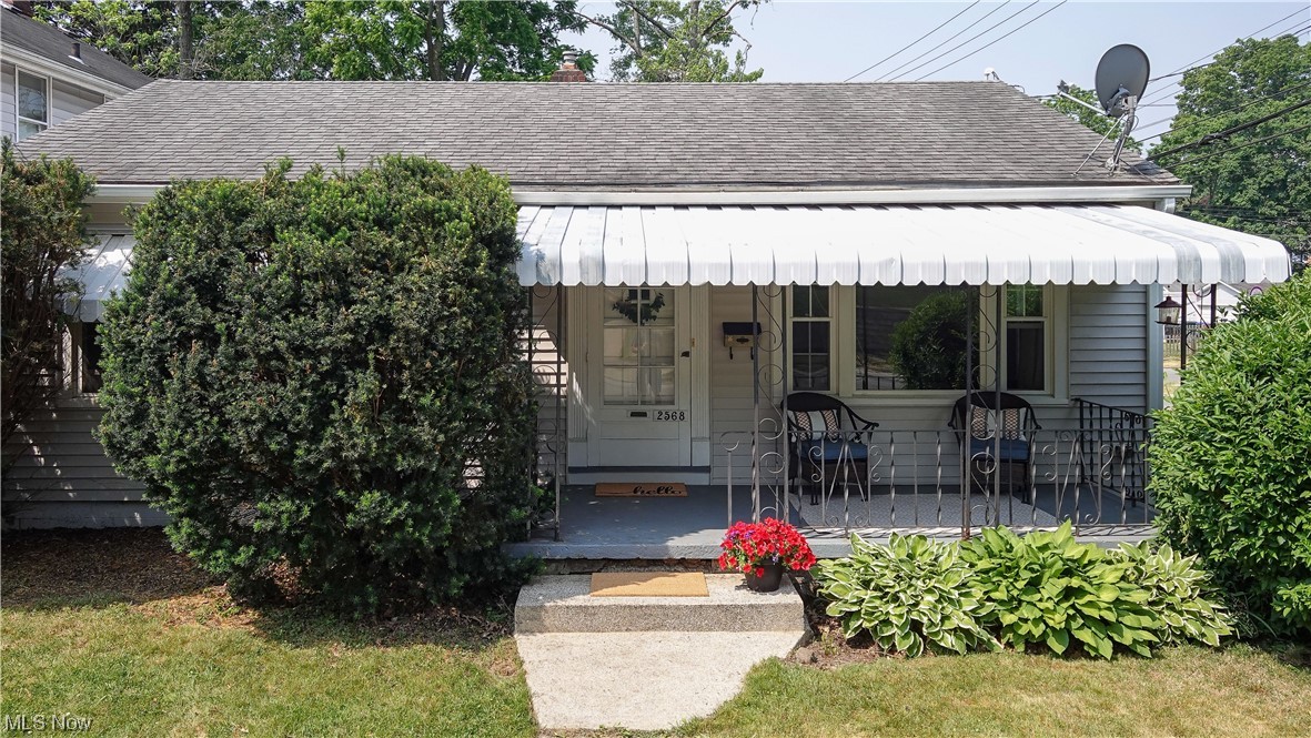 2568 Northland St, Cuyahoga Falls, OH 44221 is a cozy ranch may be just what you are looking for with close access to variety of places of interest. Less than a mile from the home you have downtown Cuyahoga Falls featuring a variety of activities throughout the year and a mix of various style of restaurants and shopping. There is a walkable river front area where you can overlook the falls and sometimes catch paddlers braving the rapids down the river. To the west of the area there is the Cuyahoga National Park system for endless hiking and outdoor experiences. Easy commuting can be found with access to route 8 running along the city and taking you north within a quarter mile south. The home itself has hardwood floors under the carpeted areas and adequate size bedrooms. There is a relaxing covered front porch which the sellers say is pretty quiet and great for having coffee or reading a book, even in the rain. There is also a lot behind them that is empty and the city owns. The basement is Partially finished with carpet and helps to expand the space in the house. There is also a plumbed toilet in the laundry area which could be finished off to be an enclosed bathroom. The utility room is about half the basements sq/ft and has plenty of room for shelving and storage. A sump pump has been installed as well. This house might be best fit for a first house, empty nesters, downsizers, alternative to condo living, or just somebody that wants to be near the many attractions nearby.
