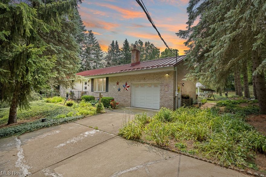 Welcome to this very well maintained beautiful all brick ranch home in United LSD! Sitting on a little over half an acre on a little hill, there is a pond, gazebo, and shed with amazing landscape all in the backyard! Enjoy watching wildlife and sitting on the trek back patio! Walking into the front door you enter the large living room with built in corner shelving. Straight ahead is a dining room with double doors to the solarium with a hot tub! Back inside if you go through the dining you will enter the kitchen. Walking down the other hallway you will find a full bathroom and two spacious bedrooms! Making your way through the kitchen into the garage with cobblestone flooring, there is a mandoor to the backyard or walk down the stairs to your laundry room and a finished basement! Wood burning fireplace in the basement. There is plenty of area for storage and does have a working toilet in basement! Don't miss the opportunity to enjoy country life just outside of town!