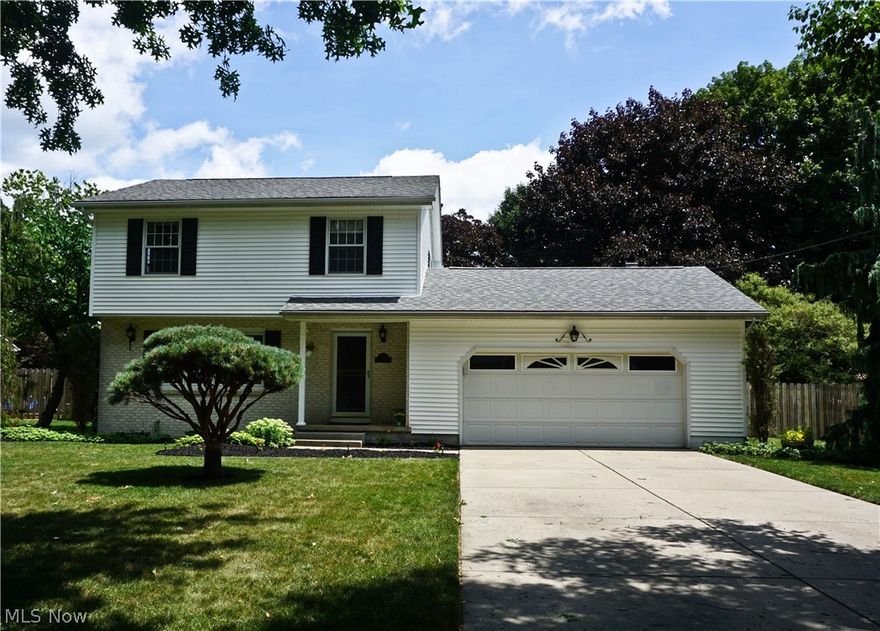 Better start packing your bags!!  Beautiful AND well cared for, this 3 bedroom Colonial has a fantastic fenced in backyard that you will absolutely fall in love with!  The spacious living room and formal dining room have both been freshly painted and have hardwood floors under the carpeting.  The formal dining room also has a bay window giving you a great view of the back yard and an abundance of natural light.  The kitchen has brand new vinyl flooring, stainless steel appliances (new in 2015), and there is room for a table. You can make the family room your own little private retreat with the fresh paint and new carpet in neutral tones. Gas fireplace and French doors (with built in blinds).  Relax in the serene setting of the park-like back yard on the awesome 2 tier deck that measures approx 38' in length. New privacy fence (2014). Yard has been freshly mulched. On the 2nd floor is a master bedroom, large enough for a king size bed, with a walk in closet, and hard wood floors under t