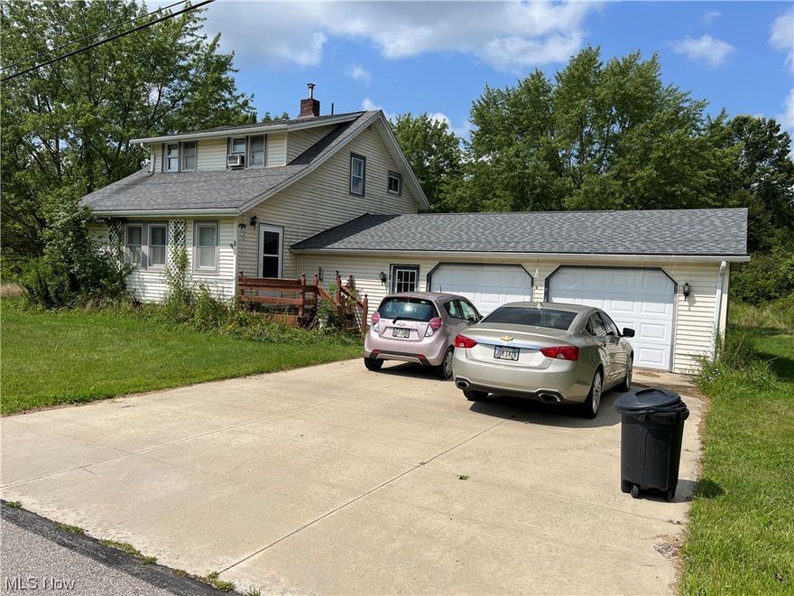 This 2 bedroom 2 full bath home has witnessed many special times for decades but it's time for a new family to make memories in it.  Updates include newer electric and windows, 1 year old roof and boiler is 10 years old.  Under the carpet is hardwood floors.  Over an acre of land for gardening, play areas and more!