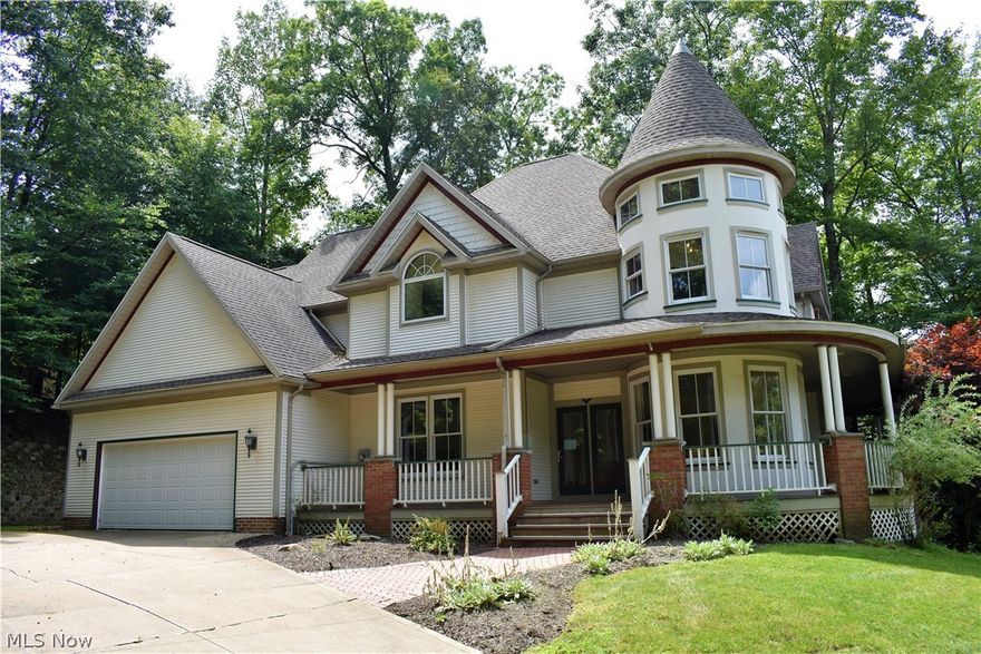 Recently updated & PRICED TO SELL, this Custom Victorian inspired home is WAITING FOR YOU!  Your personal touches can make this your Dream Home**  The Exterior provides Picturesque Views, a Wrap-around front porch, quaint backyard and newer roof** Prepare yourself as you step into the vaulted two-story foyer and gaze upon the restored hardwood floors and solid wood trim and doors.  Make your way into the Hearth Room and envision yourself sharing majestic nights with family and friends around the Gas/Wood burning fireplace.  The centrally located kitchen has Beautiful Cherry Cabinets, brand new Quartz Countertops, undermount single basin sink, new Moen spray fixture and custom island.  The first floor also features a spacious living room, formal dining room, breakfast nook, 1/2 bath and private library.  The second floor offers four generously sized bedrooms, laundry room with complimentary washer and dryer, and a guest bath with new Quartz countertop.  The Master suite incorporates a s