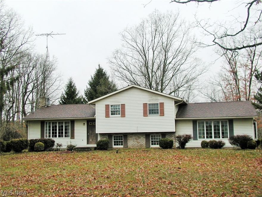 Lifetime home in a beautiful setting on 13.6 acres of woods, wildlife, and tons on privacy. This large home is highlighted by 3 bedrooms and 2 baths. Plenty of room to entertain in the 19x25 living room. Family room provides setting for relaxation. New shingles on roof in 2016. 2 large outbuildings 24x32 and 18x24 are perfect for storage. Relax on the back porch overlooking your decorative pond. 2 car attached garage. Could also be a little mini-farm. Come and see what a fantastic country setting this is. All oil and gas lease and any future royalties retained by the seller.