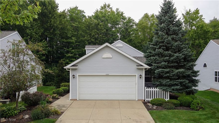 Just what you have been waiting for!  This beautiful stand alone Ranch condo  in the lakes of Aurora is located on quiet cul-de-sac.  Features include are a first floor master as well as a home office space, vaulted ceilings, gas fireplace, eat in kitchen, and finished walk out basement with a full mother in law suite complete with second full kitchen!   Each floors offers outside space with great private wooded views.  The home is nicely updated and has a newer roof, furnace, AC, water heater and California closet in the master bedroom.  
The community is tucked away off a quiet suite and offers two swimming pools, pickleball and tennis, club house and walking paths all included in a very affordable HOA.  
Set up your showing today before it's too late!