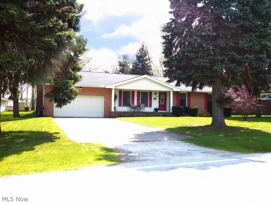 Welcome home to 292 Kent Dr., Tallmadge, OH 44278!  Outside you will enjoy the back porch overlooking the picturesque Lions Parks!  Enjoy quiet evenings on your front porch.  Inside you will enjoy a formal living as well as a family room with fireplace and a formal dining room!  The bedrooms are spacious with large closets.  Call today and start packing!