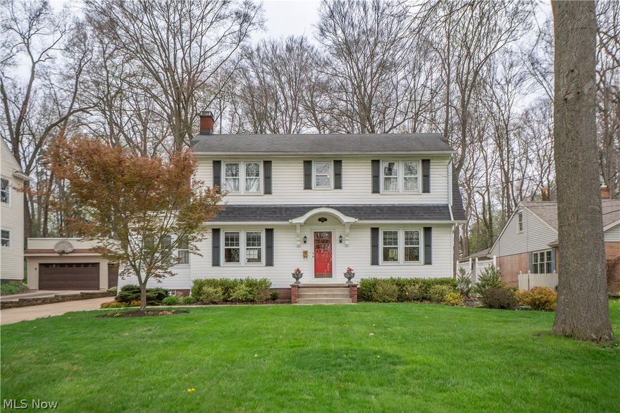 This home carries the charm and authenticity of its age, with original details that have been beautifully refinished and well cared for. Step inside to find arched doorways, hardwood floors, glass doorknobs, wide baseboards, crown molding, and built-in character throughout. The inviting foyer opens to a spacious living room with a gas fireplace and built-in bookcases, while French doors lead to a dedicated office. The formal dining room flows into the updated kitchen featuring granite countertops, cherry cabinetry, soft-close drawers, a pantry, island with breakfast bar, and stainless appliances including a gas range, microwave, and dishwasher. A convenient half bath completes the main level. 
Upstairs offers two hall closets, a charming alcove ideal for a reading nook or workspace, and three bedrooms, including an oversized primary bedroom with dual closets. The full bath was updated with stylish finishes, including a quartz countertop. The walkout basement includes laundry hookups, a utility sink, workshop space, and added peace of mind with waterproofing and glass block windows. Outside, enjoy a large private backyard with mature trees, a stamped stone patio, paved driveway, and detached 2-car garage, all tucked along a dead-end street and backing to Frazer Elementary.