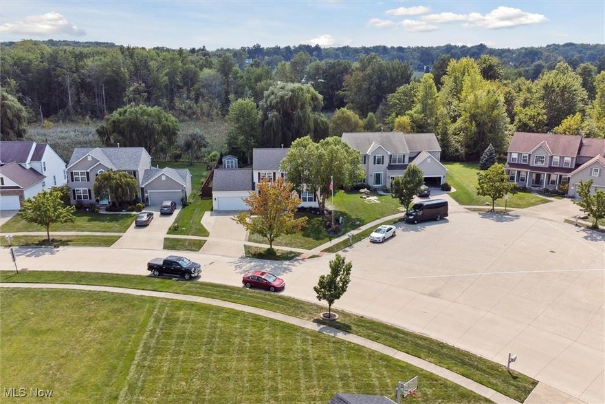 Welcome to your new dream home in the desirable Willow Creek neighborhood of Avon! This stunning Colonial home boasts 4-BR and 4 baths spread out across 3,107 SF of living space.  Nestled on a good sized fenced in lot with a park like setting.  Step inside the main floor living space & be greeted by the open concept layout with traditional touches that make this home truly unique. The main floor offers 1,262 SF of living space with luxury LVT flooring throughout. The spacious family room features a cozy fireplace, perfect for those chilly nights. The kitchen is a chef's dream with granite countertops, plenty of storage space, & a lovely morning room.  The main level also includes a formal dining room that features crown molding.  We finish off the first level with a flex space that can be used as an office, den or library. 
As you make your way upstairs you will find all the bedrooms.  The large Master Suite features crown molding & includes a Master Bath with a walk-in closet. There are three additional bedrooms and a guest bath on the second level. The finished lower level adds an additional approximately 845 square feet of living space & features a wet bar, perfect for entertaining guests and watching your favorite movies or sporting events.  The spacious lower level is perfect and includes a half bath.
This home also offers an attached 2-car garage, ensuring you'll never have to worry about parking. Only 19 yrs young, this home is move-in ready and waiting for you to make it your own. The large backyard offers a private and peaceful setting with a hot tub, gazebo, and deck overlooking the wooded area.
Recent updates includes HWT in 2020, HVAC in 2021 & a new roof in 2023.  The lower level also has a sump pump with battery back-up.
Located on a quiet cul-de-sac, this home is close to nearby shops & has easy access to I-90. Don't miss this opportunity to own a piece of paradise in the highly sought-after Willow Creek neighborhood. Schedule a showing today!