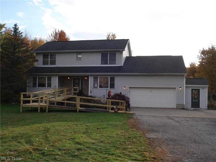 Location, Location , Location!!!!!!   4 Bedroom , 3.5 Bath Colonial on 8.1 acres in the country but close to I-90. This spacious home features huge kitchen with lots of cabinets and granite countertops and all  appliances. Step out to the rear deck and enjoy relaxing in the above ground pool or hot tub!! Walk-out basement features a wood burning stove and lots of storage room or possible additional living area. 28x32 pole building has concrete floor, electric , loft and lean-to.   Home could use a little updating but was well built and definitely a must see!!!!!