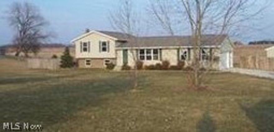 Four bedrooms, two full baths, great room, large country kitchen.  Hardwood flooring in dining area.  Sliders to 16 x 20 rear deck.  Needs paint and carpet throughout.   2+ acres includes stream and 32 x 40 pole barn with commercial sized overhead door on electronic opener. Small lean-to stable attached to rear of pole barn.   Lender owned, being sold as is and U.S. Bank does not give any representations or warranties.  Offers must included completed supplement docs required by seller (attached), completed property disclosure with no representations and loan preapproval or certification of funds if cash.