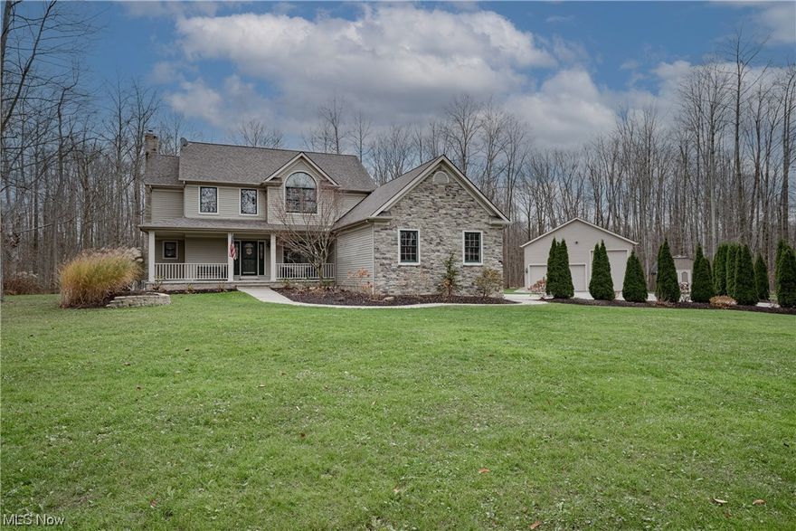 Move right into this spacious colonial on a wooded 3-acre lot in Chardon! Situated on a quiet cul-de-sac, this well-kept home features over 5100 square feet of living space with 4 bedrooms, 4.5 bathrooms, generous living areas, a beautifully updated kitchen, an in-law suite, a huge outbuilding, and so much more! The front door opens from the lovely front porch into a welcoming foyer. Straight ahead is the spacious living room with a brick fireplace and huge windows that fill the space with light. The living room is open to the eat-in kitchen that includes a full complement of stainless steel appliances, granite countertops, an eat-in area, and access to the back deck. The adjacent formal dining room is currently setup as an office / sitting room. A powder room, and a laundry / mud room complete the first floor of the primary residence. Upstairs, there are three spacious bedrooms and two full bathrooms including the impressive primary suite that boasts an ensuite 5-fixture bath and a walk-in closet. The finished lower level includes a generous rec room with a fireplace, an office, and a full bathroom. Access to the in-law suite can be found via the laundry / mudroom or from a private side entrance. This additional living suite features an open-plan living room and kitchen, as well as a bedroom with an ensuite full bath. Outside, there is a huge back deck, a patio, and a 30x50 outbuilding with 14' ceilings and plenty of space for an RV and more! Don't miss this one!!