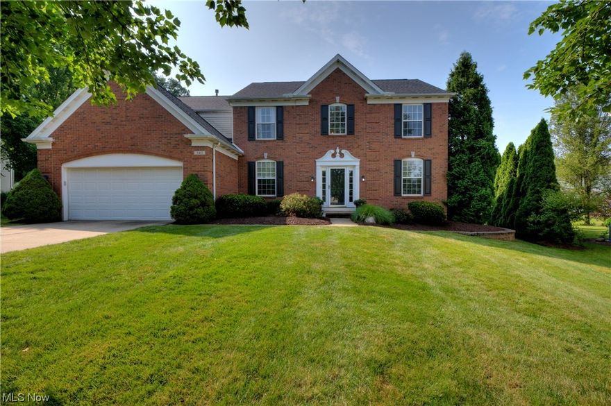 This stunning 4-bedroom, 3-bath home, located in Sagamore Hills on a highly desirable street in Eaton Estates, is a must-see! 
The two-story foyer welcomes you as you enter. The remodeled kitchen has a stylish design with stainless steel appliances, ample storage space, a beverage area with a built-in beverage refrigerator, a separate pantry, and a center island with a butcher block top. The first-floor laundry includes the washer and dryer. The family room features a cozy wood-burning fireplace, shared with the separate den/office.  The living areas on the first floor of this home offer a  seamless flow, making it ideal for both family gatherings and entertaining guests.  The well-thought-out design of the owner's suite offers an oversized walk-
in closet and a lovely owner's bath. The three generously sized bedrooms share the main updated bath with a walk-in shower and a double sink vanity.
The finished basement offers additional storage and a great entertainment space. Outside, y