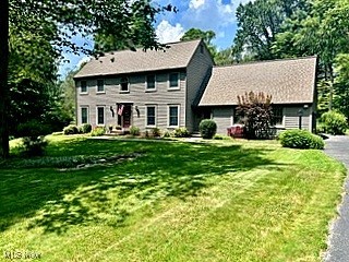 A rare opportunity to live in the Metroparks on the amazing Emerald Necklace. On the secluded, wooded, 2.13 acres, enjoy the bike/walking path along with the horse trails. This two story colonial has a 3 car garage situated on a private drive. The immaculate 4 bedroom, 2-1/2 bath colonial has been completely updated to include a new addition sunroom and full finished basement. The basement includes a utility room, workshop, workout area and large recreation room complete with pool table. Upon entering the home, find the spacious great room with wood burning fireplace and formal dining room. Additional features include the spacious gourmet kitchen with pantry, intercom system, skylights, patio, large garden and storage shed. The Owner’s suite is beautifully appointed with glamour bath. Pride of ownership both inside and out and conveniently located ¾ mile from Seneca Golf Course and around the corner from the Broadview Heights Rec Center. This is a one of a kind property.
