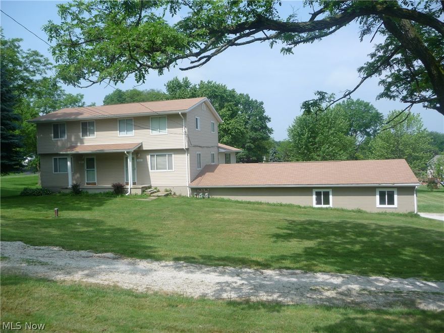 Replaced roof/gutters/siding in 2007, pool liner 2015.  (3031 side):  3 BR, 1.5 BA, living room, kitchen, 1 car garage, central air, basement.  (3033 side):  3 BR, 1.5 BA, dining room, eat-in kitchen, great room with fireplace, 1st floor laundry, recreation room, office, central air (2015), huge attached 4 car garage.  All flooring replaced in 2015, interior freshly painted in 2015.  1.5 acre lot w/in ground pool.  Includes 1 year home warranty.