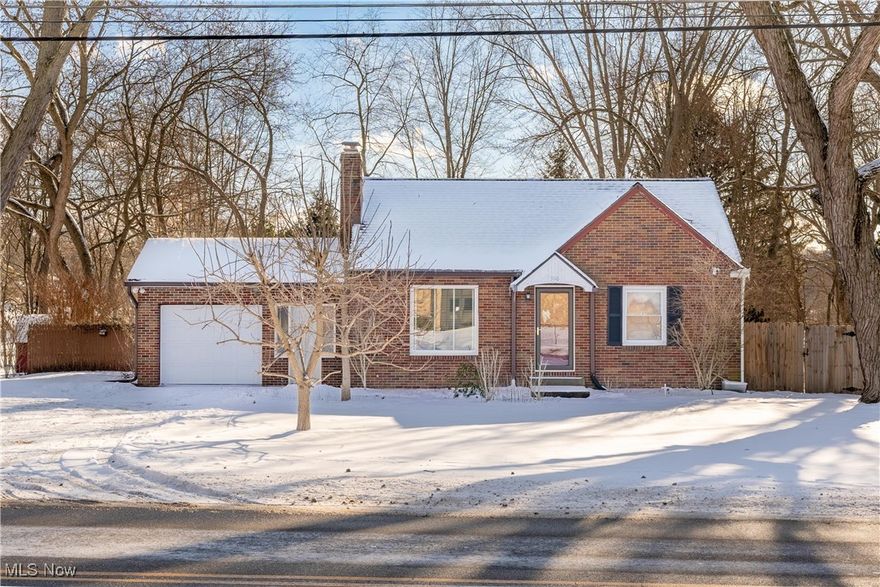 This brick bungalow is a gem you won’t want to miss! The inviting front porch welcomes you into a home filled with charm and character. Upon entering, you'll be captivated by the spacious rooms, arched doorways, and an abundance of natural light throughout. The great room boasts beautiful wood floors, a cozy fireplace with a classic mantle, and large windows that flood the space with sunlight. Adjacent to the great room, you’ll find two generously sized bedrooms with ample closet space, a full bathroom featuring a tiled tub-shower combo, and convenient built-in storage in the hallway. The eat-in kitchen is perfect for gathering with loved ones, offering plenty of cabinetry, abundant counter space, and serene views of the peaceful backyard. Upstairs, the expansive third bedroom includes a deep closet and additional storage, making it versatile. The walk-up basement features a full bath with a standing shower, a laundry area, and endless potential for additional living or storage space. Step outside to enjoy the relaxing .65-acre backyard, complete with a brick paver patio, partial privacy fences, and a handy storage shed—ideal for outdoor living and entertaining. This home is conveniently located near parks, schools, and shopping, with updates including Insulation in the attic, backup pipe in the basement, hot water tank, new water lines, the crown on the chimney, front screen door, electrical in the kitchen and basement, new gutters/downspouts, new back door and windows on garage, roof and so much more. Schedule your private showing today and see all this charming home has to offer!