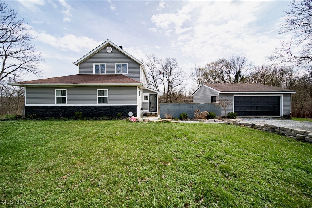 Calling all visionaries, investors, and DIY enthusiasts! This 4-bedroom, 2.5-bath home in the heart of Concord, Ohio, is brimming with potential. The owner began updates, leaving the perfect opportunity for a buyer with a toolbox and a dream to bring this home to its full potential. Located in a highly desirable area, this property offers convenience and opportunity—just minutes from the freeway, shopping, restaurants, schools and medical facilities.
The new addition of a three-season sunroom provides a welcoming transition into the home, leading you inside where possibilities abound. Inside, you’ll find a spacious family room featuring a wood-burning fireplace, perfect for cozy nights. The kitchen is an open-concept space with high ceilings with access to a deck. The primary suite boasts a custom-tiled shower and private full bath. A first-floor bedroom can double as a home office, while the second-floor observation deck offers a peaceful retreat. Outside, enjoy the stunning custom stone patio with a built-in fireplace, an ideal space for entertaining or relaxing.
With solid bones and a fantastic location, this home is just waiting for the right buyer to finish what was started and create something truly special-Renovate and Reap the Rewards!