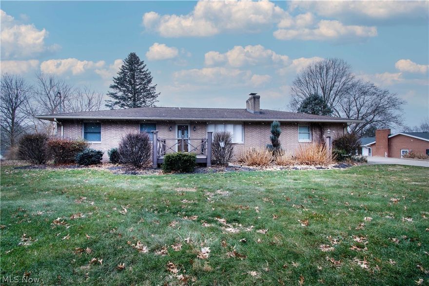 Welcome to 1692 Greenburg, an all brick ranch home located in Green school district. This well-maintained home has a lot to offer, with over 1,550 sq ft of living space. Enter the living room with a lovely gas fireplace with built-in shelves on both sides and a bay window overlooking the front yard. The eat-in kitchen offers Corian countertops, appliances, a tile backsplash, an abundance of cabinets, a large pantry with access to a pulldown attic, and a dining area with access doors to the deck and backyard. Three bedrooms, a full bath with a beautiful tile surround/backsplash, and built-in drawers on the hallway complete the main floor. The partially finished basement features a spacious laundry room with countertops & utility sink, a convenient second full bath with a walk-in shower, a recreation room with recessed lights & glass block windows, a Cedar closet (4x9), and a storage room with massive built-in cabinets to hide away your decorations,  tools, and more. -Three cars garage w