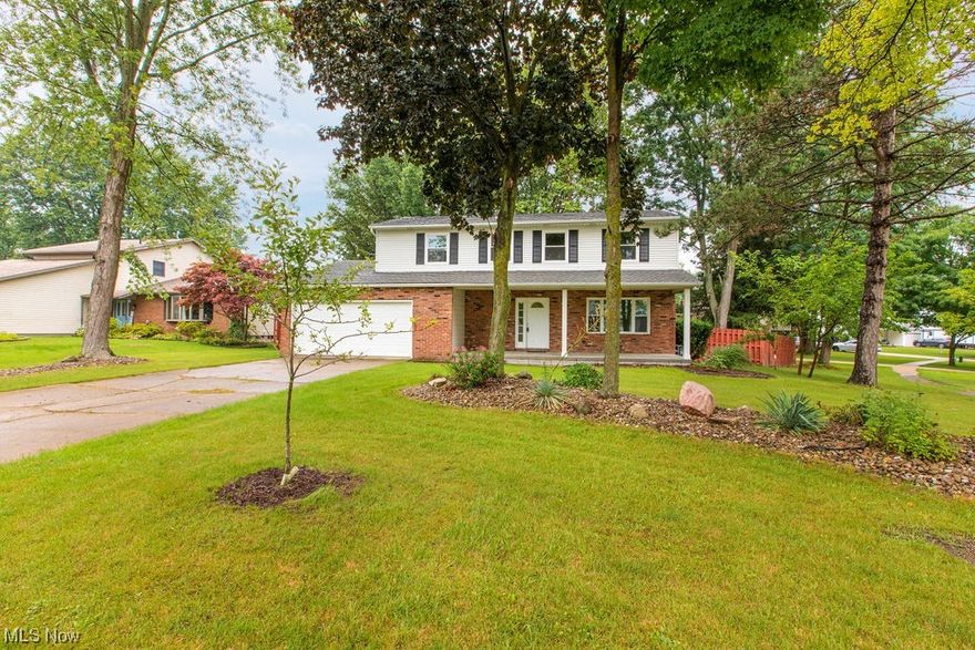 Looking for a spacious family home on an expansive lot in Brunswick? Look no further! This timeless colonial offers four bedrooms and 2 1/2 baths, with a generous 2000 sq ft of living space. Start your day off right on the covered front porch, or unwind in the sun-filled living room featuring new luxury vinyl flooring. The kitchen boasts tile floors, ample cabinet space, and gorgeous granite countertops.

The family room leads to the expansive fenced backyard, complete with a shed for additional storage. Upstairs, you'll be amazed by the size of the bedrooms, all featuring hardwood floors. The master suite is a true retreat, with a large full bathroom and a stunning walk-in closet. The fully remodeled hallway bathroom is sure to impress.

The lower level of the home is unfinished, waiting for your personal touch and future needs. The home has been thoughtfully updated in 2023, with new porch concrete, windows, basement waterproofing, three remodeled bathrooms, HWT, carpet, interior