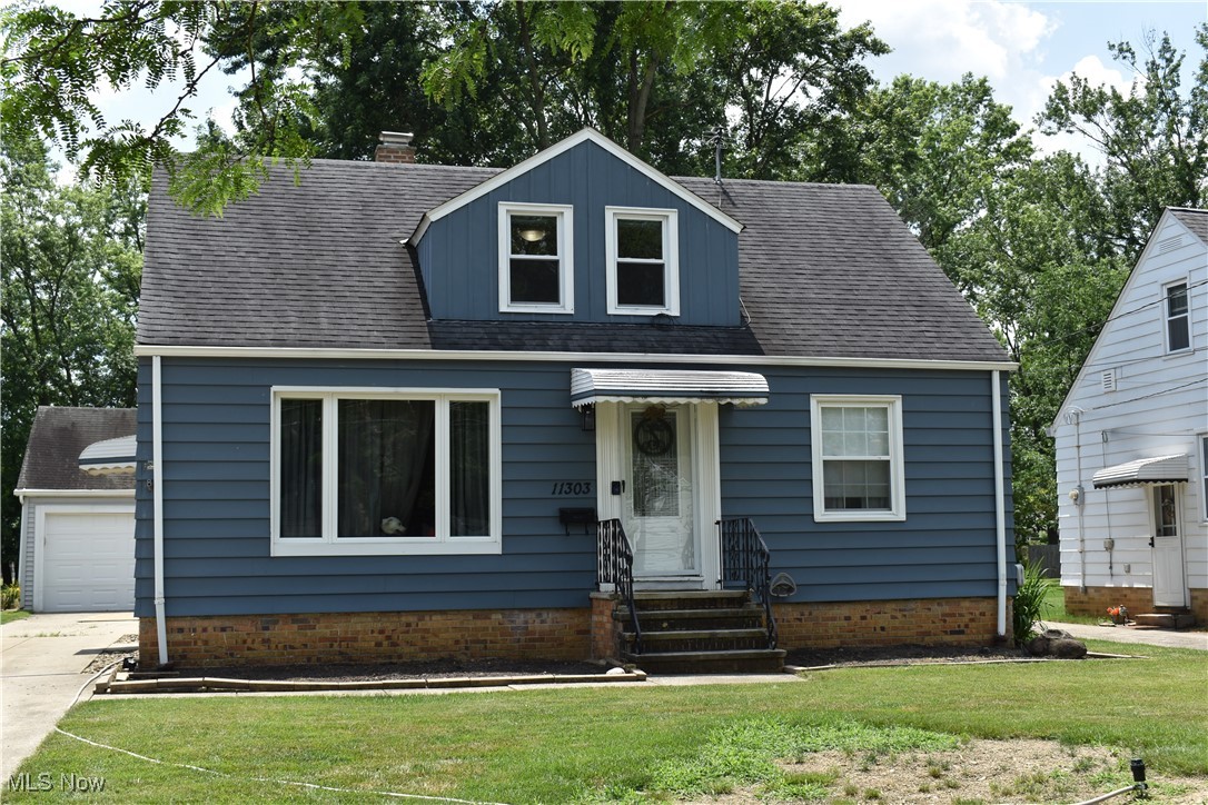 Cute cape cod located on a quarter of an acre in Parma Heights with a good size set back. The living room has a large picture window allowing lots of natural light and hardwood floors. The two bedrooms on the main floor also have hardwood flooring. The eat in kitchen features an exposed brick chimney and sliding doors to the fenced in area of the yard. The chain link fencing is sturdy and extra high. The upstairs is a large carpeted bedroom with plenty of storage. The basement is partially finished with a roomy full bath. Close by is the Western Campus of Tri-C and Nike Site Park.