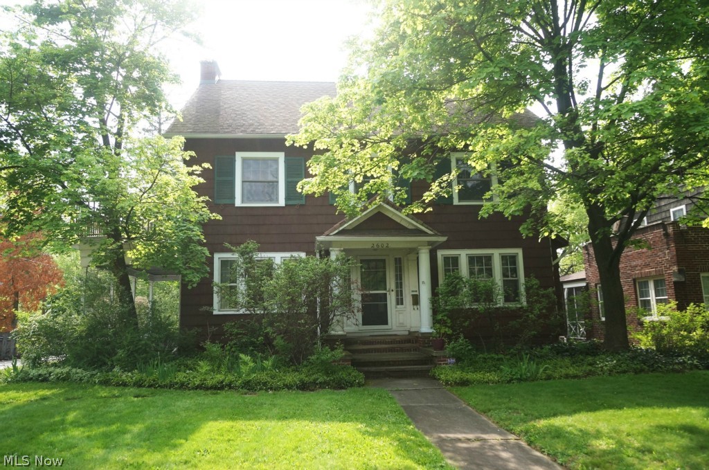 Charming & Spacious Cleveland Heights Colonial on Beautiful Brick Lined Street! CHECK OUT THE 360 DEGREE PANORAMIC VIRTUAL TOUR!!! Large Formal Living w/ Fireplace & Access to Covered Side Porch. Formal Dining Room. Updated Kitchen. First Floor Family Room/Den w/ Wood Burning Stove, Beautiful Vaulted Wood Paneled Ceilings w/ Skylight, & Built in Closets & Shelving! Four Bedrooms on 2nd w/ Access to Open Side Porch. Additional Bedroom and Full Bath on 3rd. Newer Windows on 2nd & 3rd Floors. Newer 2+ Car Garage. Extra Deep Backyard! Minutes from the Cleveland Clinic, UH, Case, University Circle, & Area Shopping, Dining, & Entertainment! Call for Your Private Showing Today!