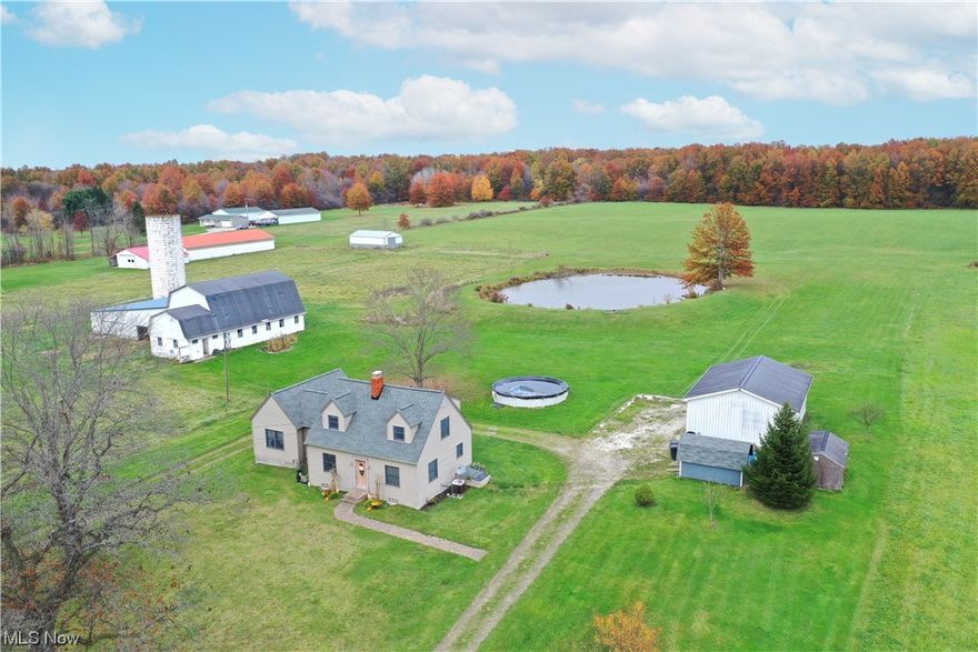 Looking for that perfect farm? Nice remodeled home with all of the modern conveniences!
Gorgeous kitchen with quartz countertops, newer appliances, updated luxury vinyl flooring.
First floor laundry and first floor owner's suite with a walk in shower and a beautiful tub.
Three additional rooms upstairs with a full bath. Enjoy your amazing patio with a nice view of the above ground pool and pond. Detached garage plus a pole barn and a massive barn with a spacious hay loft area! New roof installed on the house October 2023. All of this is situated on 25 plus acres!  Do you self a favor and schedule your showing today!