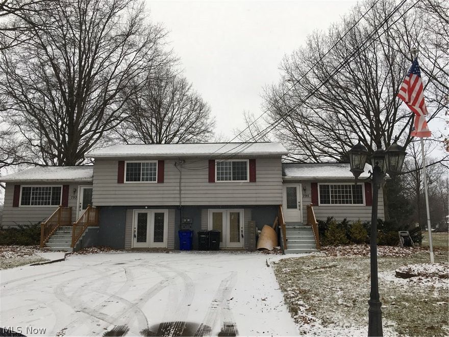This is presently a duplex with seperate enrances for 793 and for 795Mishler. Each floor plan set up as a mirror of the other. There are two furnaces, HWT, and C/A units. It could be easily convert to single family residence with some reconstruction of interior to then encompass all 3396 square ft as one home. The property is serene and spacious.  It's within a few minutes of Wingfoot Lake State Park or the famous Hartville Kitchens, not to mention close to the freeway or Good Year Blimp headquarters. Make it your home and rent the other side, or reconstruct to your own desires.