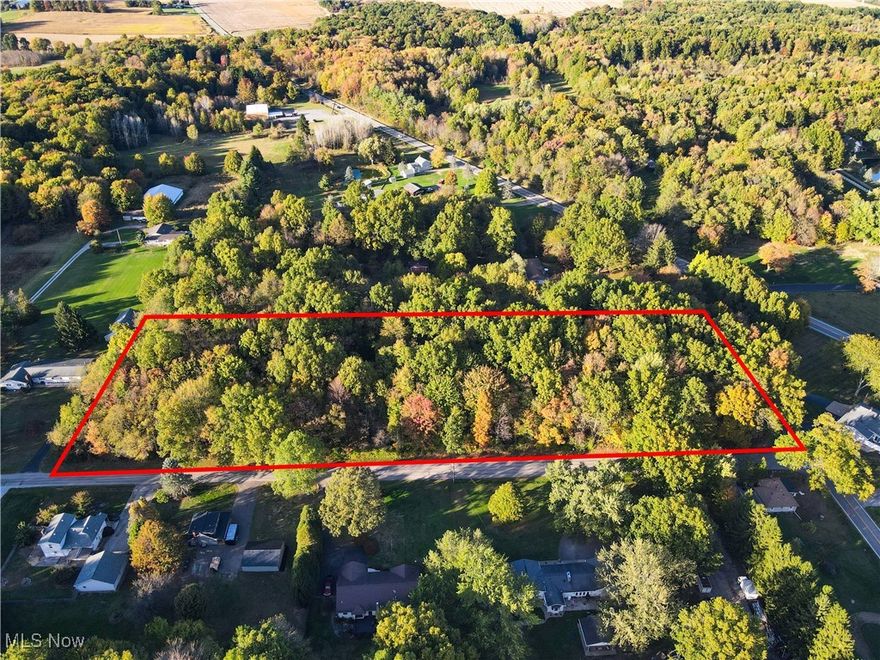 AMAZING 5.28 Acres of Land in SOUTH RANGE SCHOOL DISTRICT.  Land is at the corner of Middletown & Green Beaver Road.  Lot Size is 734 x 270.  This land is within walkind distance to South Range High School.(0.3 miles)