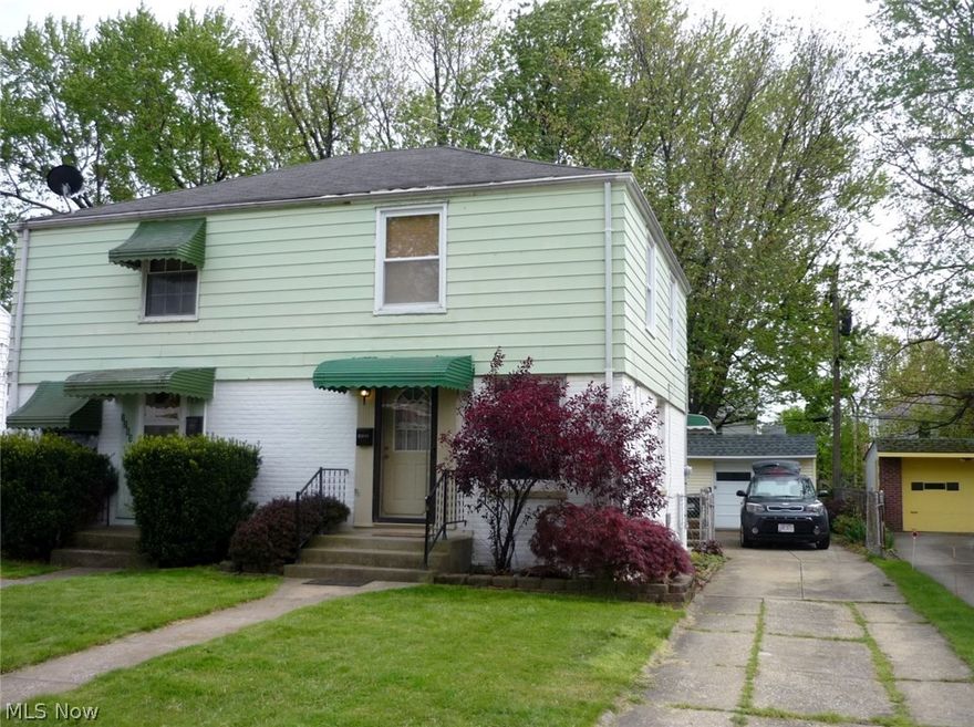 Move-In Ready!!! clean home, ideal first time buyer. Kitchen with oak cabinets & appliances, Hardwood floors, updated 2nd floor bathroom with neutral tones, full partial finish basement with built-in storage & Extra commode, other half is separated and used for laundry and storage purposes, glass block windows, fenced yard, enclosed back porch, newer windows & doors, roof on back porch and garage replaced in 2015, you'll love the convenience of its location. Just walking distance to the bus line, library pool, playgrounds, high school and all the shopping conveniences you can ask for. Show it today!