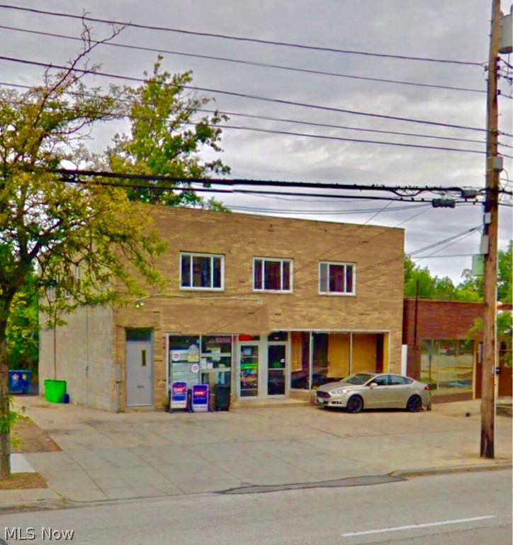 Exceptional opportunity!!! Zoned Retail, this building consists of 2 store fronts and 2 apartments. BRAND NEW large parking around east side of adjacent building. High visibility with great traffic and foot pattern. Both store froms have restrooms and Central Air. Convenience store has 15 year lease (start 2016). Tenants pay gas/electric. Owner to pay water/sewer.