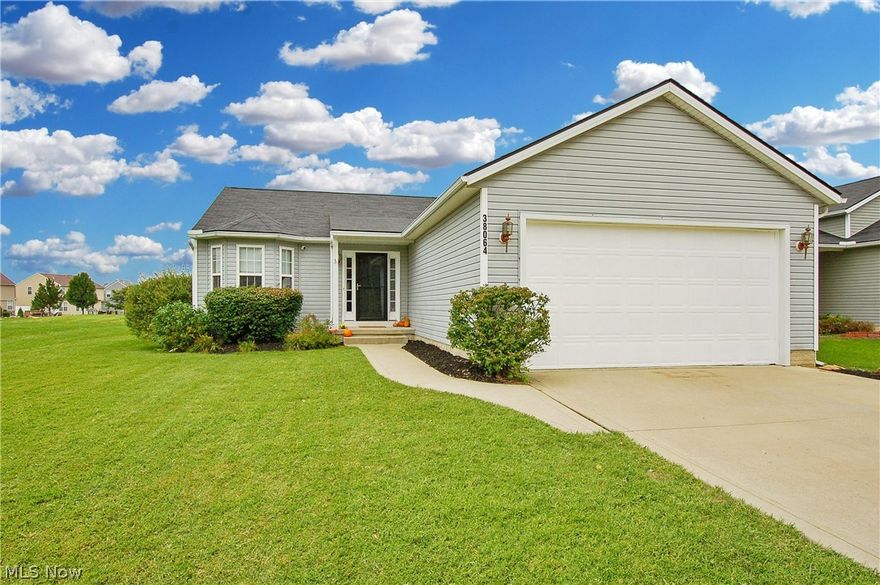 Welcome to home to 38064 Vista Lake Way in North Ridgeville.  Meadow Lakes offers a quiet and inviting community!  You can move right into this well cared for Ranch home.  This home features wide open spaces with high vaulted ceilings.  The Living room features a large bay window letting in lots of natural light and a fireplace for a very cozy atmosphere. The eat-in kitchen has large peninsula with additional eating space that is great for entertaining, baking and more!  Kitchen also features hardwood floors and leads to the sunroom.  The sunroom is currently being used as additional dining room space. Owner’s suite features dual closets and an updated bathroom (2018).  The basement was finished off in 2013 and is incredible!  TV/Movie area, reading nook, open recreation space, a large half bathroom and still offers a huge 20 x 19 storage area and a workbench area – the workbench stays! The exterior of this home boasts of amazing features including:  fenced in yard (2009), paver patio