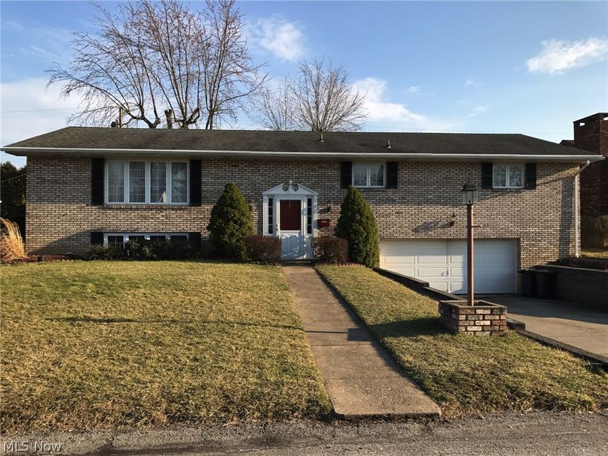 Beautiful 4 BR/3 bath brick home in one of the most desirable neighborhoods in Steubenville.  Stainless steel appliances, hardwood floors. Brand new recessed lighting, brand new A/C. Gas FP. Master bath. Huge 2.5 car garage. Very large double sinks in main bath. All bedrooms on same floor. Very large rec room/5th BR on LL w/full closet. Almost 2900 sqft of total finished space. Flat yard big enough for play and entertainment, but not too big to maintain.  Home sits on oval shaped street perfect for walks and riding bikes.  Convenient to everything....the perfect family home!