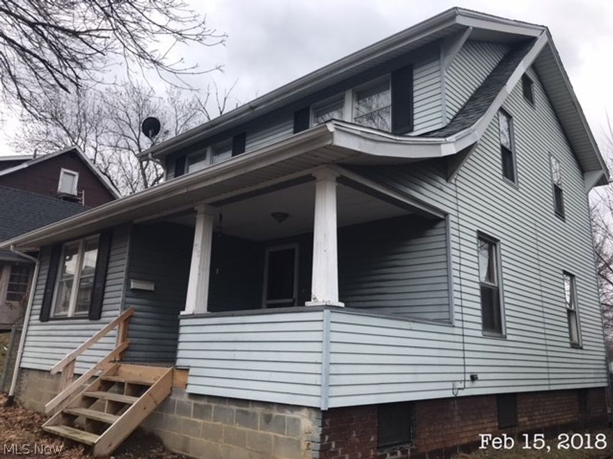 MOVE RIGHT IN to this updated Colonial Style home!  Large 24 x 24 pole building type garage with alley entrance.  New carpet and fresh paint.