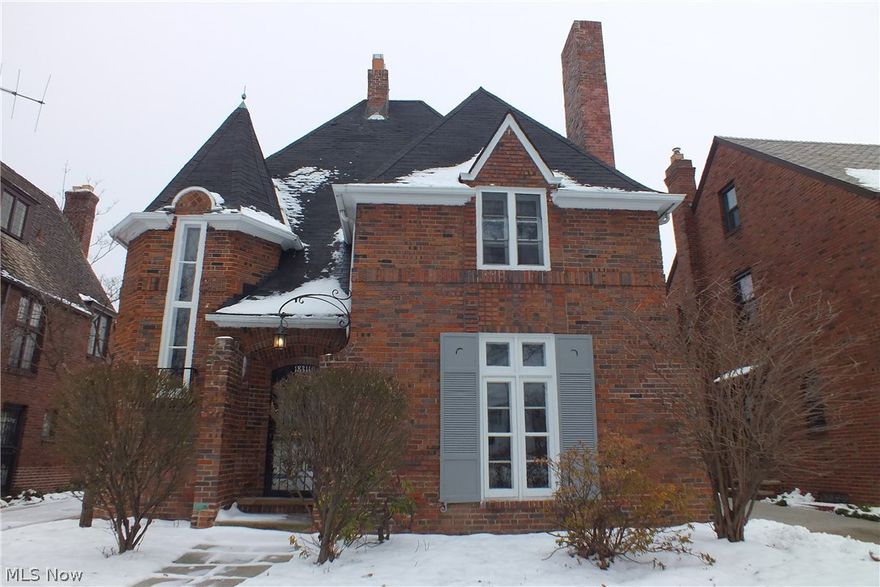 Beautifully updated Shaker Heights Colonial with circular staircase! Breathtaking curb appeal on this Lomond home. Fantastic kitchen with black granite countertops, 2016 new cabinets & 2016 new stainless steel appliances. As you step into the grand foyer and look into the Living Room & Dining Room you'll be pleasantly surprised at the exquisite wood detailing throughout with gorgeous architectural design. Four total bedrooms. Renovated bathrooms include a first floor powder room and a full bathroom on 2nd & 3rd floors. Nicely finished lower level. Third floor suite has full bath with shower perfect for guests or teens! First floor has a huge covered rear porh off the Kitchen. This house is special! Easy commute to downtown, hospitals, universities and Cleveland's cultural hub -- University Circle. Convenient to I-271 and rapid transit. Don't miss this home!