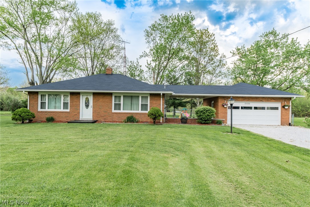 Beautiful possible 3 bedroom 2 full bath ranch in Marlington schools on almost an acre. Newer roof, fence, 200amp electric, hot water tank, windows & doors. Partially finished basement also features a second kitchen, glass block windows & glazed tile. Eat in kitchen features a large pantry.