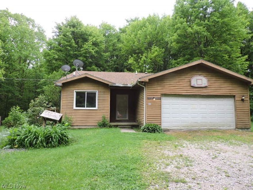 This is a Fannie Mae Home Path Property. Remote wilderness living in this unique Rome Township home. Nestled off the beaten path among the trees is this frame/ cedar sided 4 level split designed home. Front entry foyer with kitchen area and dining  on the first floor with sliding glass doors to deck. The lofted living room above overlooks the dining area while the remainder of the upper level features three bedrooms including master suite with bath and family bath.  The lower level off front entry offers two more bedrooms, family room and another full family bath plus walk out to rear yard. Sitting on approximately 5 acres this home has two additional storage sheds and small pond.