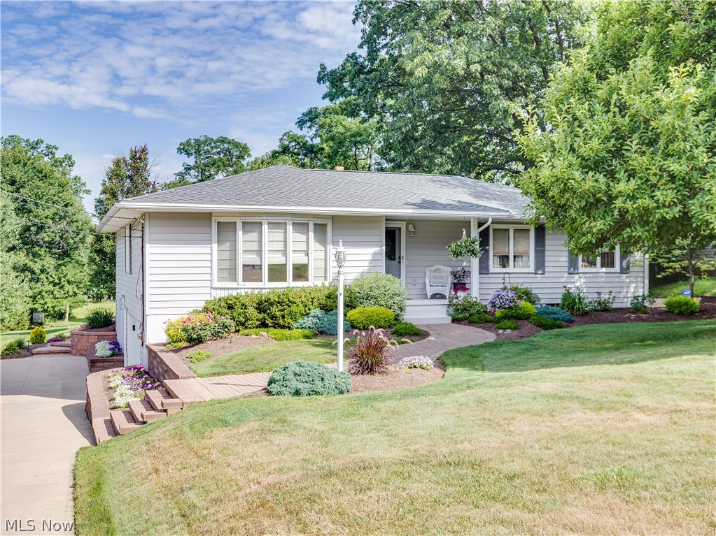 Just move in, to this meticulously maintained and updated ranch. As you walk into the ceramic tiled foyer, every detail of this home reflects pride of ownership, from the new doors to the hardwood floors that adorn the bedrooms and main hall. The completely remodeled kitchen has an abundance of beautifully finished maple Schrock cabinets, newer Samsung appliances, and Corian counter tops. The formal dining room is spacious enough for any family gathering and is steps away from the living room, kitchen, and family room. The family room has great views of the nicely landscaped yard, deck, patio and fire pit on a double .88 acre lot. All three bedrooms are located on the first floor and the master bedroom has a lovely remodeled bath with marble accents. The bathrooms have all been professionally updated and tastefully decorated. The finished walkout basement adds another 643 Square feet of living space and provides an excellent area for entertaining or work as it includes a recreation roo