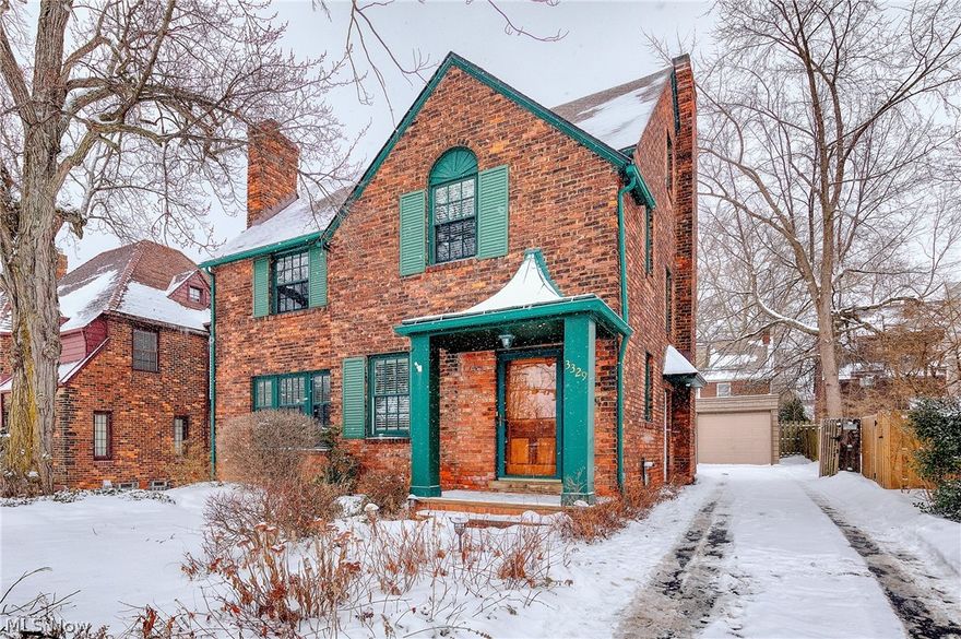 Gorgeous Brick Colonial in the Fernway area of Shaker Hts is a shining penny! Architectural details & many hardwood floors throughout. Eat-in Kitchen features white wood cabinets, black granite counter tops, glass tile backsplash, buffet style cabinetry, & there's a pass through to the Family Room. Spacious Living Room w/brick surround gas fire place has built-in library shelves & opens to the Dining Room. Dining Room has crown molding with French doors leading to a large Family Room with beamed ceiling, newer carpeting & glass slider to the back paver patio & fully fenced yard. First floor has a nice updated powder room and there's a door from the Kitchen that also leads into the backyard. Upstairs there's a roomy Master Bedroom w/ a (2008) updated Master Bathroom w/a step-in shower. There are an additional 2 Bedrooms on the 2nd floor w/ ceiling fans & hardwood floors (beneath carpeting) There's even a 2nd floor balcony off of one of the guest bedrooms! There's another Full Bathroom o