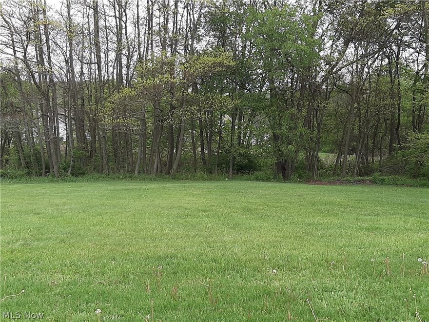 Nice well-cared for residential double lot in the city.  Rear of lot lined with trees for privacy. Lot outside of Georgeview Estates where new homes were just built in 2025. Owner has blueprints for a walk-out home that was drawn up for this lot or build any style to suit. There are two lots combined that must be sold together. Build now to quality for a 15-year tax abatement through the city. Call listing agent for more details.
