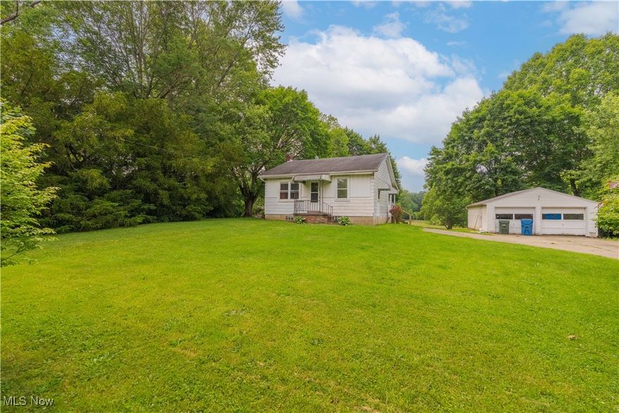 Welcome to this charming two-bedroom, one-bath ranch home in desirable Green Schools district! Nestled on just over two and a half acres of land, this cozy home features a brand-new septic system installed in 2024. The home also boasts a convenient walkout basement, adding extra potential to the living space. The property includes a spacious two-car detached garage and is perfectly situated close to the freeway, shopping, and restaurants, offering both convenience and tranquility. Currently tenant-occupied, with a tenant who would love to stay. This home is ideal for first-time buyers, those looking to downsize, or investors seeking a great opportunity. With a little vision, this property holds endless potential! Call today to schedule your private showing.