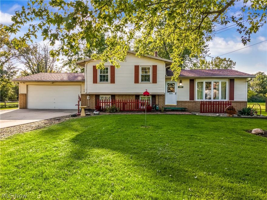 Welcome to this stunning split level located on a fabulous lot in Springfield Township.  This inviting abode offers 3 bedrooms and 2 full baths.  There is a large living room at the front of the home that offers tons of natural light.  There is a spacious eat-in kitchen which offers ample cabinet and counter space.  Don't forget the sunroom off the eat-in kitchen.  Enjoy chilly fall evenings in the family room with a wood burning fireplace.  All of the bedrooms are situated on the second level.  All of this plus a 2 car attached garage and an additional 3 car detached garage with a carport for the car enthusiast. The lot is flat, just under a full acre and has mature trees.  This home is absolutely move in ready and awaiting a new owner.  Fabulous home and a great location.  Call to schedule a showing today!!