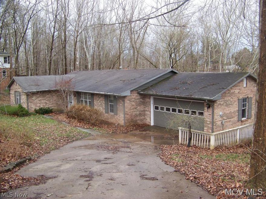 This brick ranch offers a lot of potential! Spacious home with 5 bedrooms, 3 full baths, formal living room, formal dining room, 2 large family room areas in the walkout basement. Rear deck off of dining room and lower level patio and additional decking overlooks lovely 1.4 acre lot. M670 JJ  Elem: Putnam Elementary School  Elem/Bus: N  JrHigh: Marietta Middle School School  JrHigh/Bus: N  High: Marietta High School  High/Bus: N  Fire: VOL  Police: SHF  ;SQFT=Fin L1:1828, Fin Bsmt:914, Fin Above:1828, Fin Total:2742, Unfin Above:200;GAR= 2 Car Att