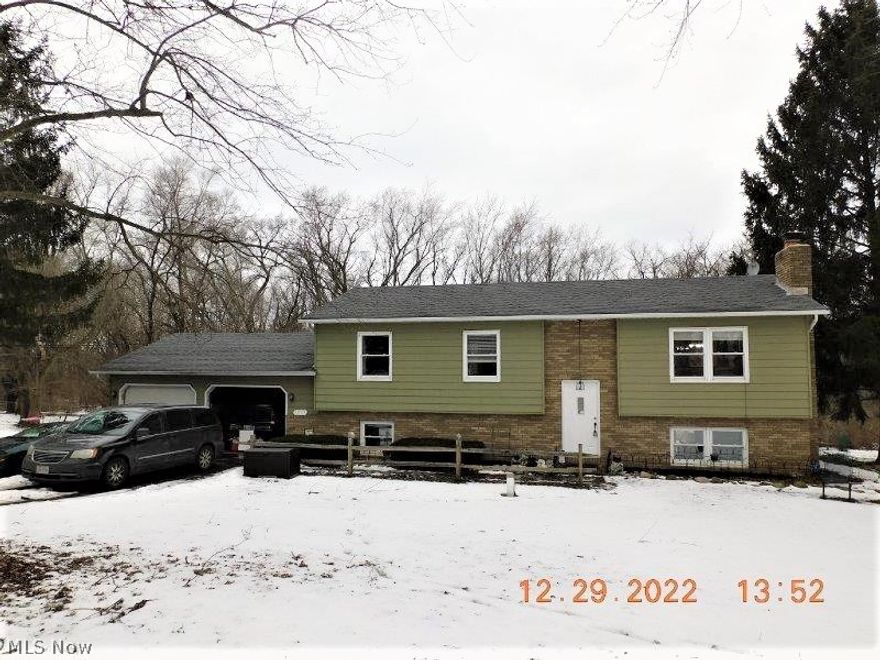 Welcome Home to this beautifully updated 4 bedroom 2 full bath home setting on 1.7 acres in Saybrook Township!  just a couple miles south of the Lake Erie shoreline docks and beaches! The interior is updated with luxury vinyl plank flooring and fresh paint throughout that gives a calm and relaxed feel. Other updates include most elec baseboard heaters, thermostats, light fixtures, woodburning fireplace insert with blower, patio doors with beautiful views of the parklike back yard! the upper bathroom includes a Bluetooth speaker. There is a warm open flow from the dining to living room. The Food pantry upstairs that could be converted back into a closet.  You have a huge mudroom, nicely updated laundry room and large closets throughout. Walk out on the back decks from the dining room OR family room with a magnificent view! The beautiful back yard includes cherry, pear and apple trees, sumac that blooms colorfully in the summer and a large garden area you can make your own. In winter enj