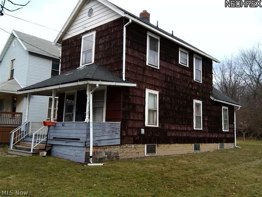 Gain Instant Equity NOW! Great Rental or Move in! this house is Priced to sell with motivated seller looking at offers. Trumbull County Auditor valuation is $20,970. Great Potential Two Story Colonial Will be a Century Home Soon, Home sits on 2 lots 60 foot frontage, private 130 deep yard & backs into thick woods. blacktop&gravel drive where a razed two car garage once was. Shows Grandma's love from yesteryear! Old fashioned country front porch Spacious rooms, Vintage  kitchen cupboards, nostalic steel&porcelein sink, refridgerator. Formal Living Rm.&Formal Dining Rm. Original wood glass single French door Enclosed back sun porch, Upstairs two spacious bedrooms, full bath. Basement with fruit cellar updated Furnace & Hot watertank, both one year old Commode &laundry area. New 100 amp electric box. bring your paint carpet & flooring ideas make this diamond in rough shine. Make us an offer we can't refuse have a nice house cheap! less than price of a car or trailer very Motivated seller