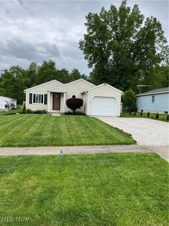 One year home warranty included with purchase for that piece of mind. Welcome to this quiet friendly neighborhood. There are no houses behind you. 2 bedrooms one bath upstairs with a half bath two extra rooms and a living room downstairs ,house was built in 1994 with numerous updates starting with a roof in 2021 basement has drywall and naughty pine walls. All new lights and Fans stainless steel appliances, flooring extra cabinets added for extra storage and a coffee bar area .New windows electric heat pump with central air installed . A privacy fence added , LG stackable washer and dryer ,farmhouse doors throughout walk-in shower and vanity added too! It’s a rustic feel turnkey ready schedule your showing today.