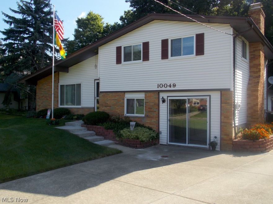 Welcome home to 10049 Serene Court!  Totally updated home located in one of Northeastern Ohio's highly ranked suburbs. Beautiful kitchen boasts quartz counters and opens to formal dining.  Sun Room graced with walls of windows overlook private, lushly landscaped and totally fenced in  backyard. All bedrooms feature hardwood flooring.  Lower level family room offers full brick fireplace.  Both full baths are updated. Oversized garage is heated and offers abundant storage.  Numerous updates include:  Roof 2011, Kitchen 2012, Gutters 2008, Upstairs bath 2009, Windows 2007, Garage Door 2012.  Call today for a private tour of this meticulously maintained home.